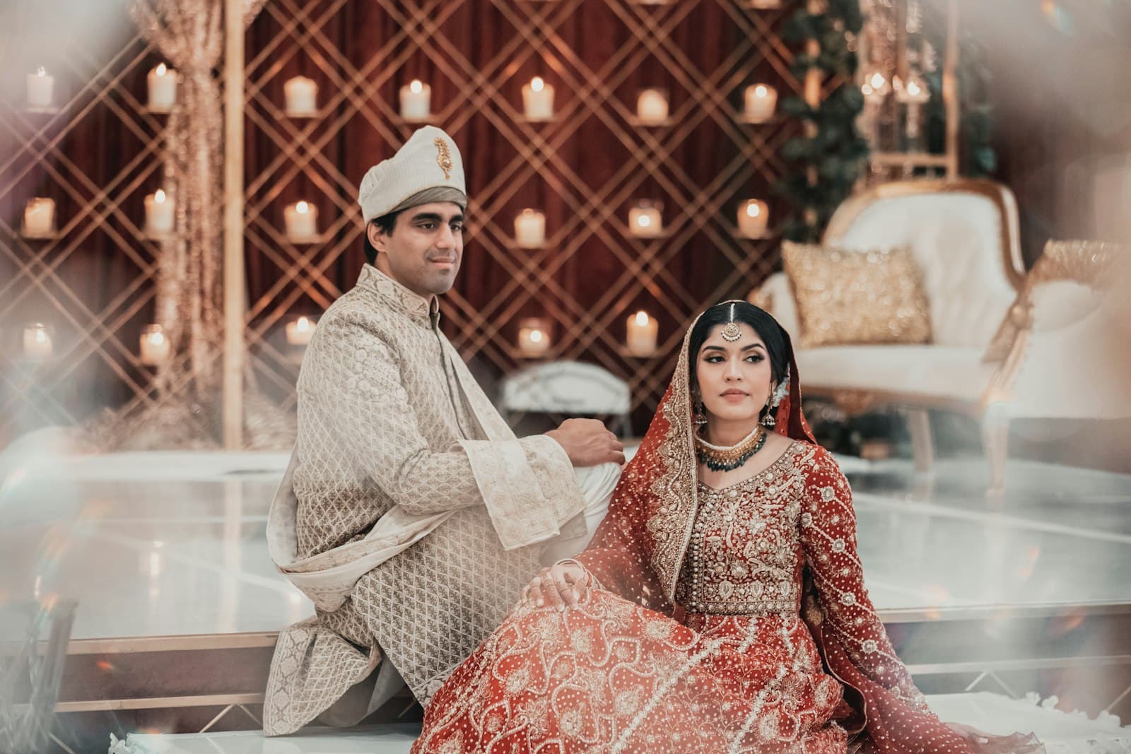 A couple seated together at their wedding ceremony