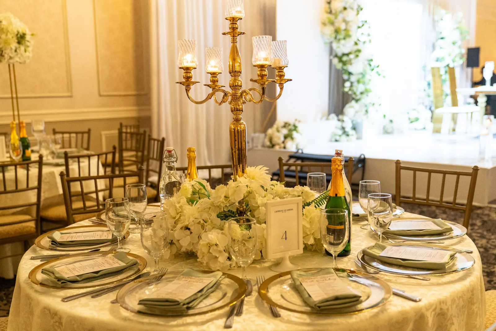 Elegant gold and cream wedding reception table